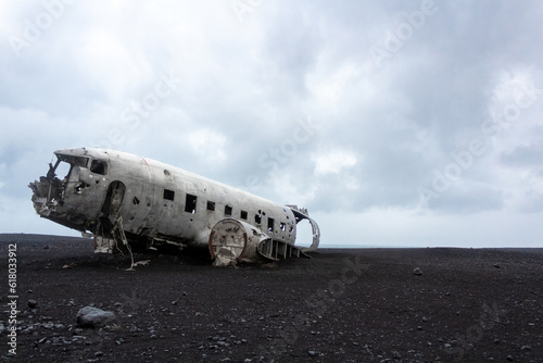 Plane wreckage on a volcano sand beach