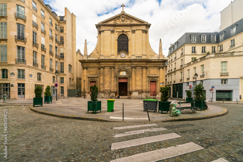 Basilica Notre-Dame des Victoires at Place des Petit peres in Paris photo