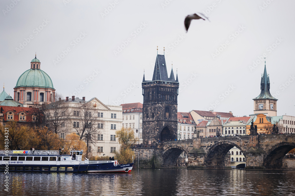 center of Prague with view of Vlatva and Charles Bridge in autumn