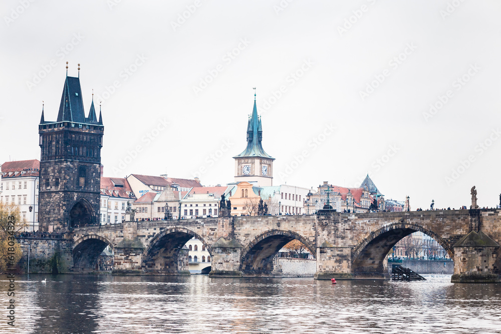 center of Prague with view of Vlatva and Charles Bridge in autumn