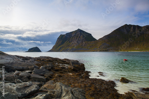 Red rowboat on the sean near the Leknes city, Lofoten island, No