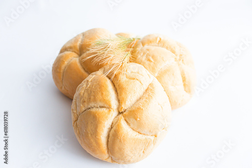 Wallpaper Mural Bread rolls with wheat ears. on a white background. Close-up. Torontodigital.ca