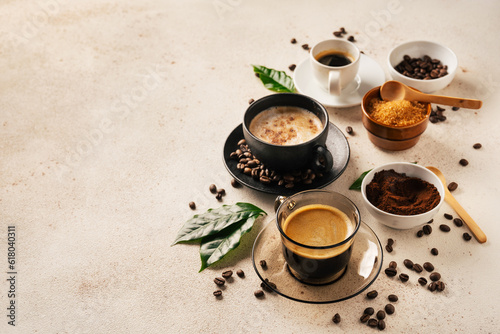 Coffee cups on light beige background . Copy space. Top view