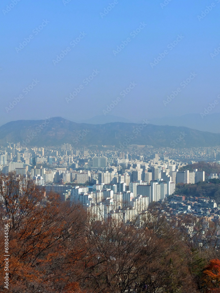 High angle view of Seoul city with mountain and blue sky