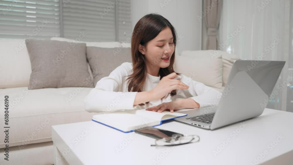 Owner asian business woman calculate expense and cost of goods by laptop computer and record in notebook at home office store. Student asian girl study online via laptop computer at home. Owner asian business woman calculate expense and cost of goods by laptop computer and record in notebook at home office store. Student asian girl study online via laptop computer at home.