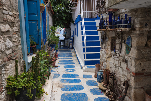 Fototapeta Naklejka Na Ścianę i Meble -  Blue street on the greek island of Samos in summer