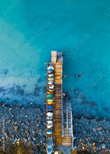 Colorfull boats at a dockyard photo