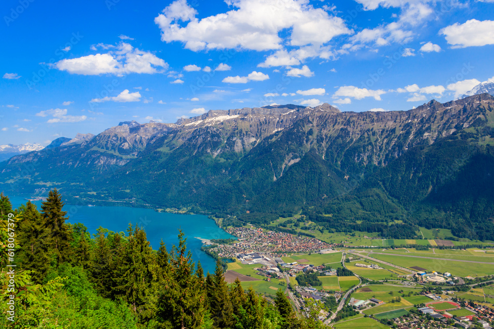 Breathtaking aerial view of Interlaken, Lake Brienz and Swiss Alps from Harder Kulm viewpoint, Switzerland