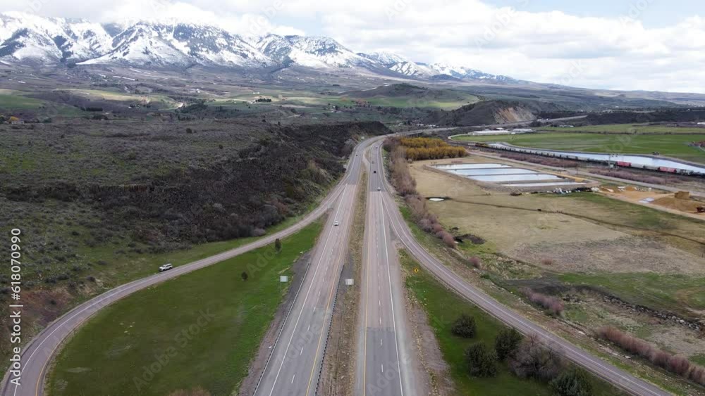 Idaho is a mountainous state known for its large deposits of precious metals, including gold. American wild nature and landscape. Highway with amazing mountain view. Idaho is a mountainous state known for its large deposits of precious metals, including gold. American wild nature and landscape. Highway with amazing mountain view.