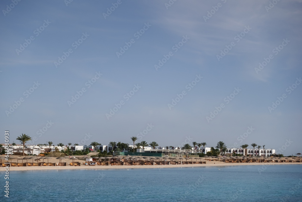 buildings palm trees and the beach from a resort in marsa alam on vacation
