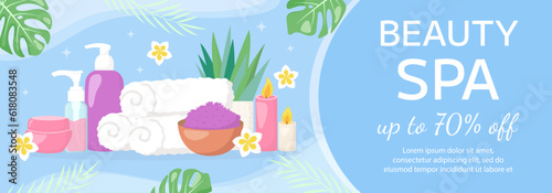 Vector beauty spa salon banner template. Towels, cosmetics products, tropical leaves, flowers on blue background. Beauty industry, massage service flyer, brochure, sale coupon