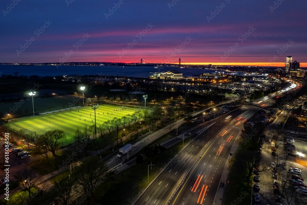 Aerial view of Calvert Vaux Park in Brooklyn, New York during a beautiful and colorful sunset Aerial view of Calvert Vaux Park in Brooklyn, New York during a beautiful and colorful sunset