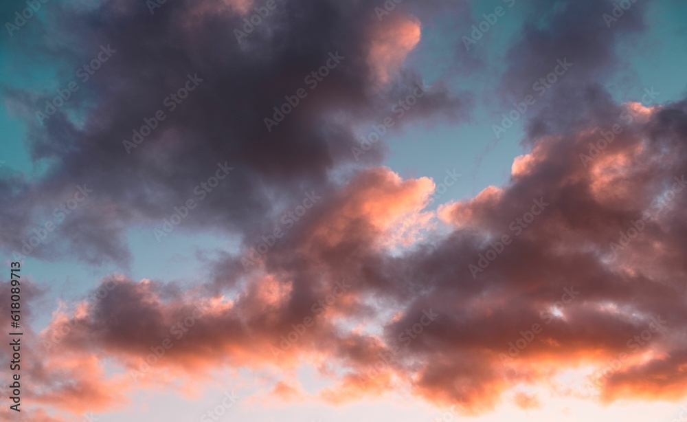 Stunning sunset sky featuring vivid orange and pink hues throughout the horizon
