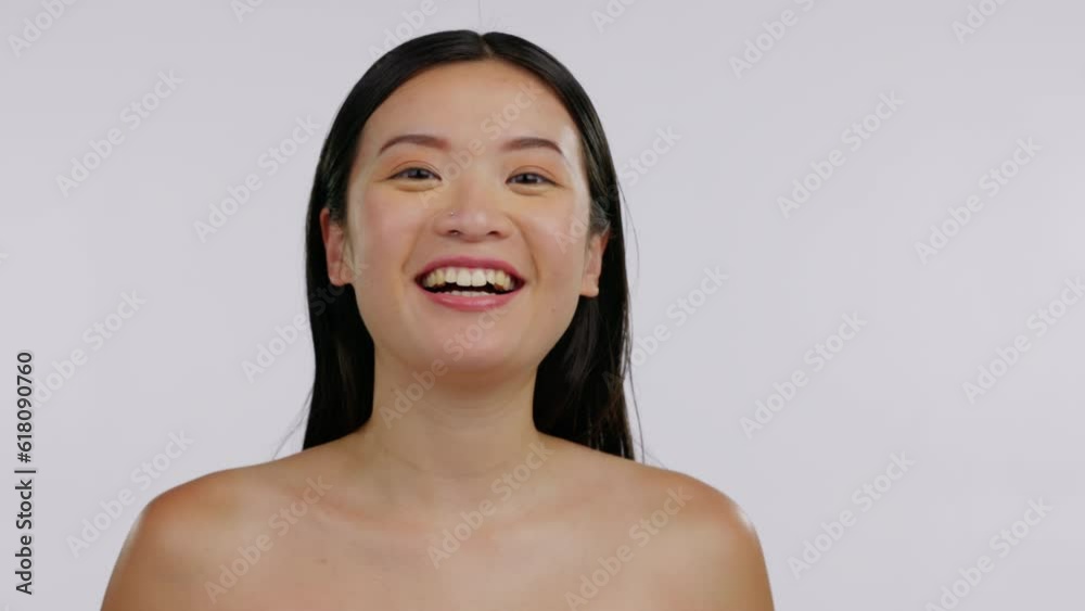 Asian woman pout, face and beauty, skin glow with dance and blow kiss on studio background. Flirt, happy and energy, dermatology and female model, skincare and natural cosmetics with mockup space