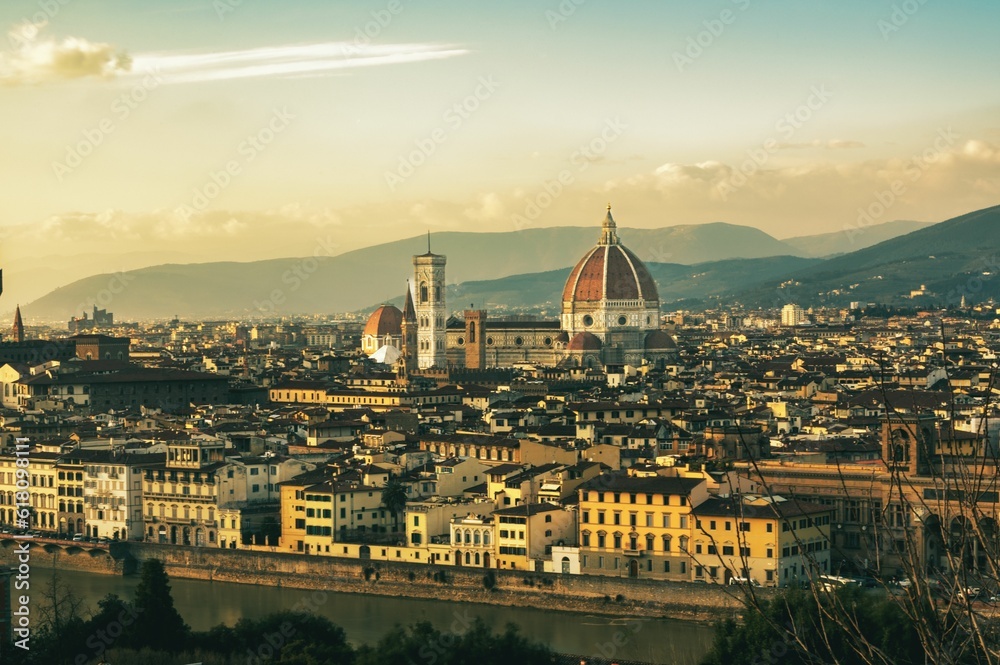 Aerial view of the cityscape of Florence with Cathedral of Santa Maria del Fiore in the distance
