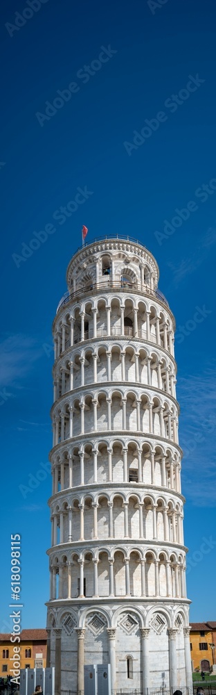 Beautiful shot of the historic Leaning Tower of Pisa under a blue sky