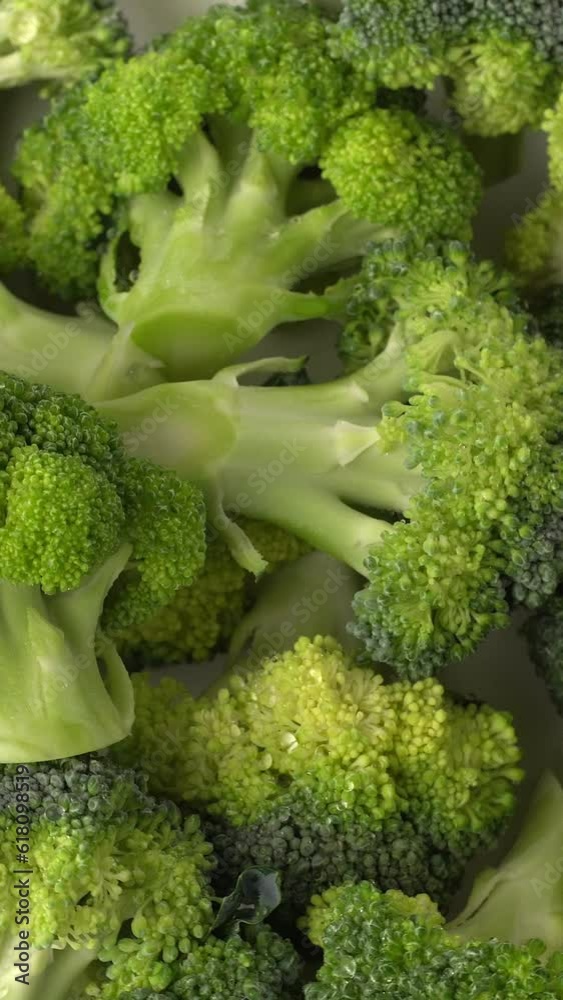 Closeup of ripe cut fresh broccoli with waterdrops