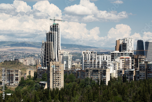 Saburtalo Vake district in Tbilisi  Georgia on a sunny summer day with beautiful clouds.