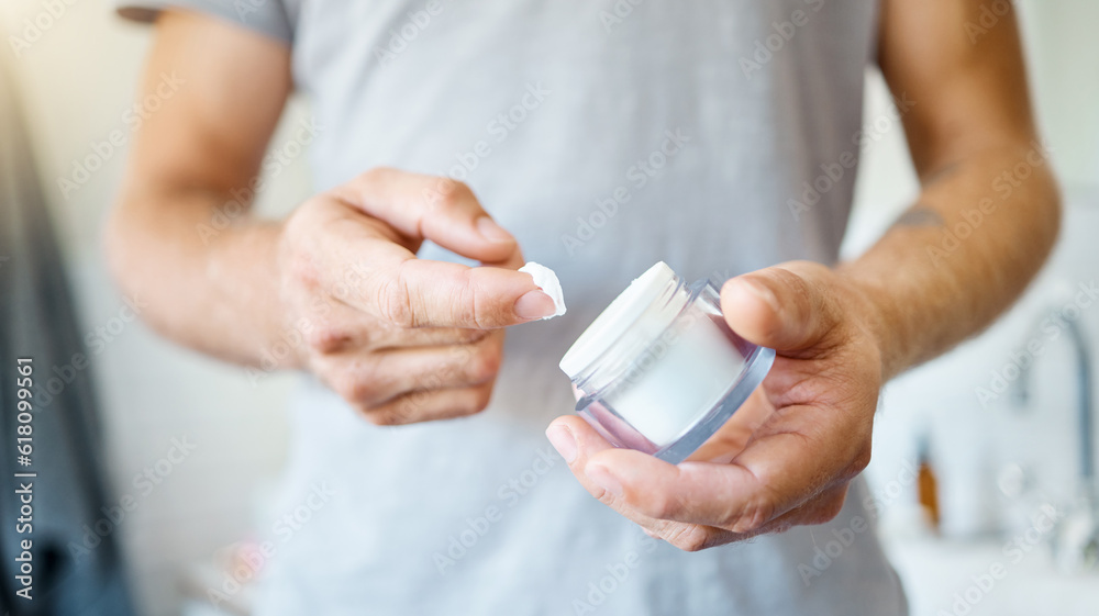 Bathroom, cream and hands of person with skincare body product for self care, skin hydration or morning beauty treatment. Cosmetics lotion, dermatology and closeup model apply moisturizer at home