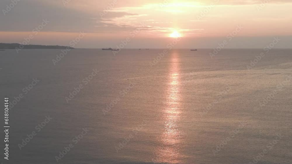 Drone view over a tranquil lake during sunset Drone view over a tranquil lake during sunset