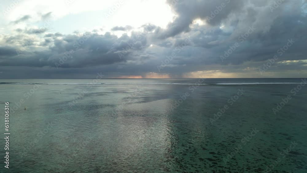 Aerial video of sea waves in crystal clear water on a cloudy day Aerial video of sea waves in crystal clear water on a cloudy day
