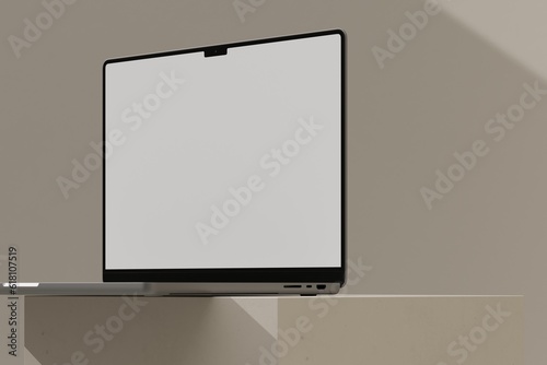 Laptop on beige block (ID: 618107519)