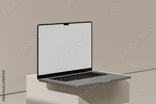 Laptop on beige block (ID: 618107541)