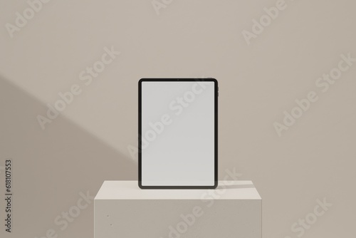 Tablet on beige block (ID: 618107553)