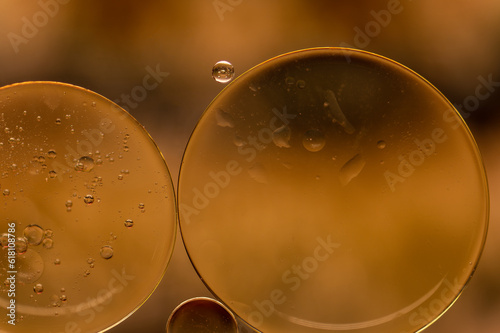Abstract colorful bubbles. Soft background with gold and copper color circles.
