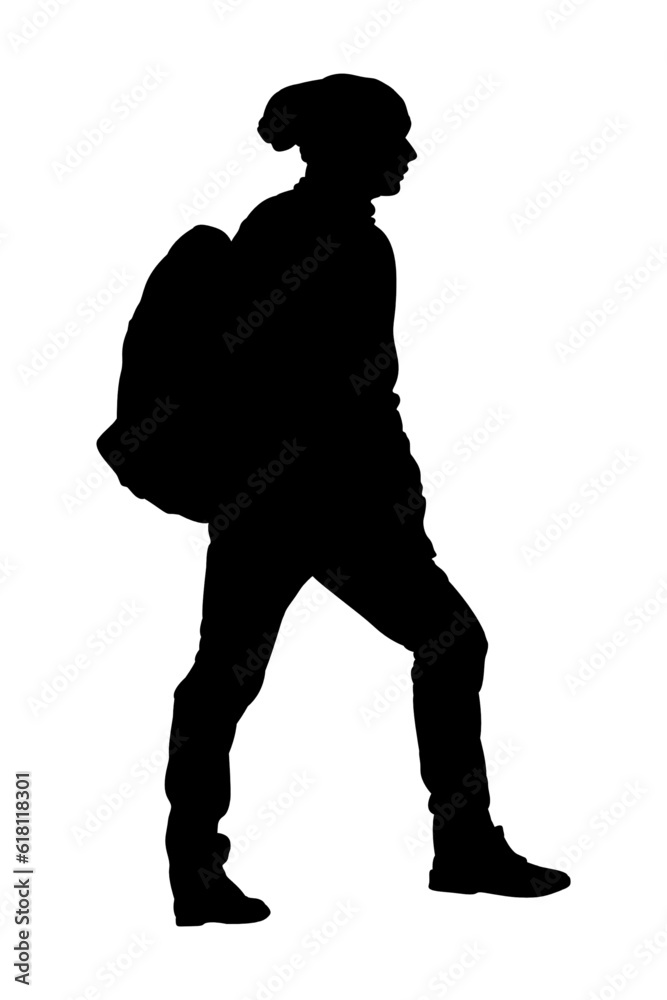 silhouette of a man with a backpack
