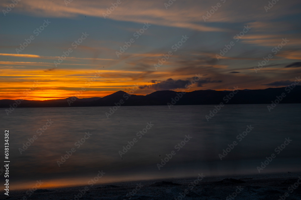 Exceptional sunset view on the lake, as known as Salda Lake, blue and red colors, horizontal photo