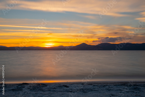 Exceptional sunset view on the lake, as known as Salda Lake, blue and red colors, horizontal photo