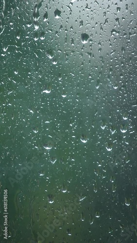 vertical video of window rain drops