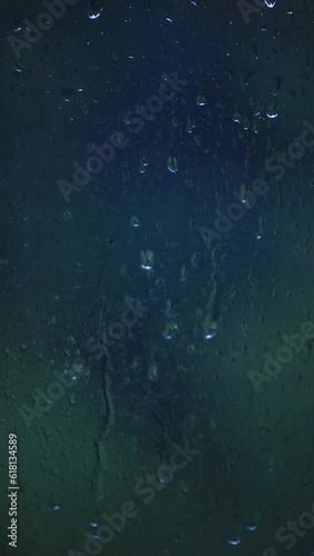 vertical video of window rain drops
