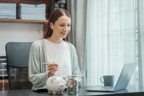 Close up young woman saving money for household payments coin, piggy bank, mutual fund, mixed fund, Super Saving Funds (SSF), Retirement Mutual Fund (RMF), Net Asset Value (NAV), dividend, Inflation