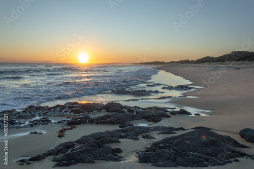 Sunset by the ocean
