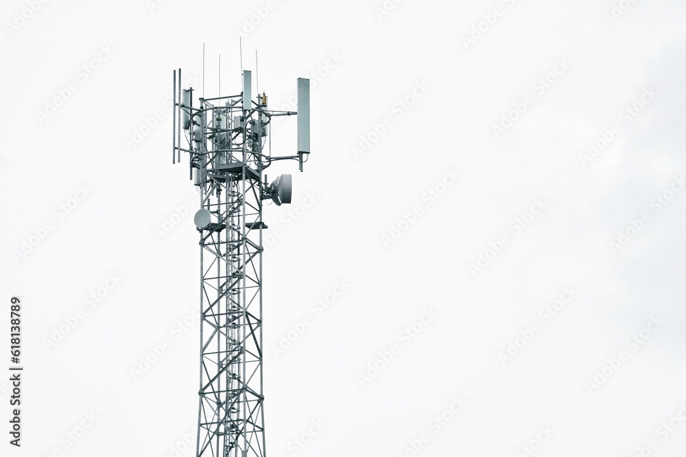 Telecommunication tower of 4G LTE Advanced and 5G cellular. 5G radio network telecommunication equipment with radio modules. Macro Base Station. Telecommunication tower of 4G LTE Advanced and 5G cellular. 5G radio network telecommunication equipment with radio modules. Macro Base Station.