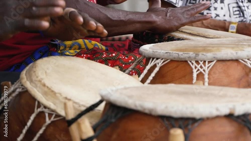 Hands of Black Musicians Playing African Traditional Drums Close-Up