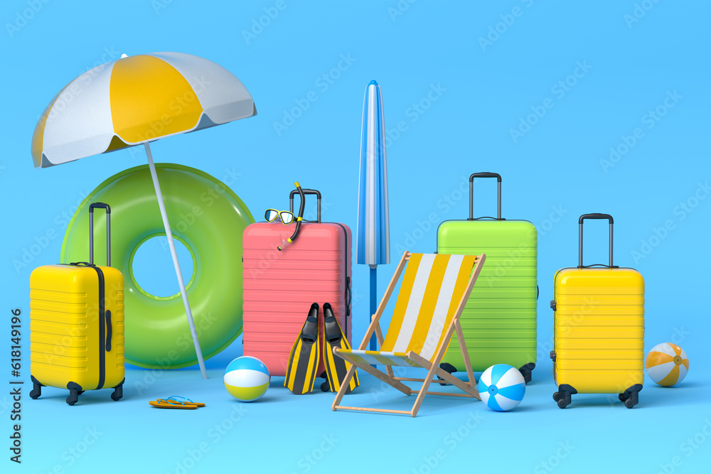 Colorful suitcase or baggage with beach accessories on blue background.