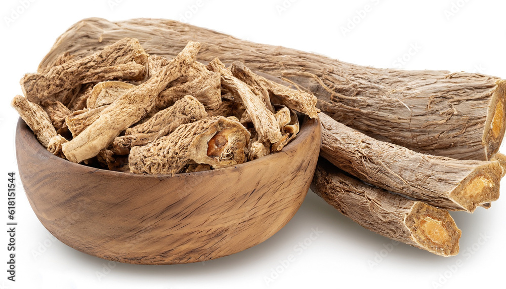 Calamus root in wooden bowl, isolated on white background. Sweet flag, sway or muskrat root. Dry root of Acorus calamus. Calamus root in wooden bowl, isolated on white background. Sweet flag, sway or muskrat root. Dry root of Acorus calamus.