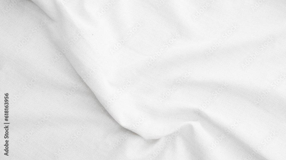 Fototapeta premium Organic Fabric cotton backdrop White linen canvas crumpled natural cotton fabric Natural handmade linen top view background organic Eco textiles White Fabric linen texture