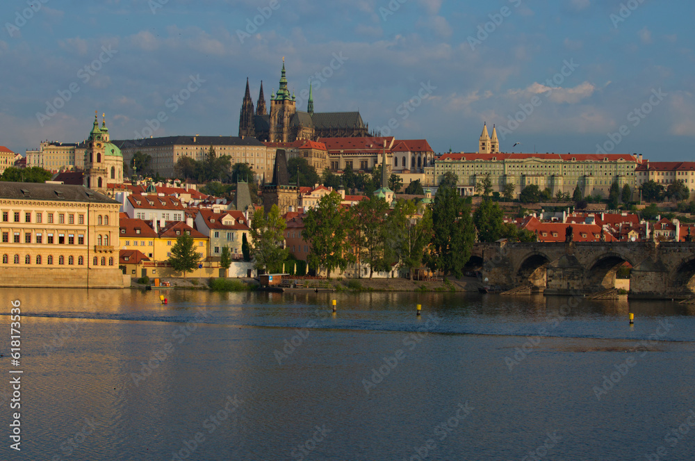Scenic cityscape view of medieval Prague. Panorama of ancient Prague Castle and Saint Vitus Cathedral with Vltava River. UNESCO World Heritage Site. Travel and tourism concept