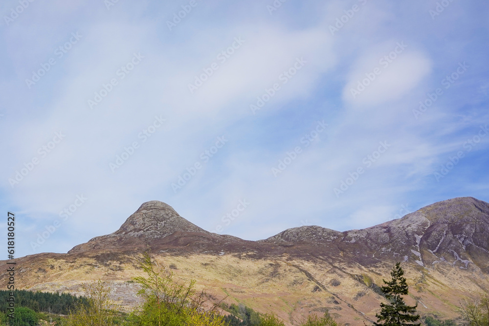 A mountain top in Glen Coe near An Torr woodland in the Scottish highlands