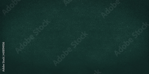 Green abstract background. Black green emerald vintage backdrop, texture of board, paper, wall, paint stains. Dark wallpaper with place for design 
