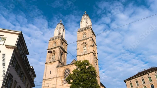 Zoom in time lapse of two bell towers of the Grossmunster reformed church in Zurich, Switzerland photo