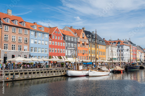 Nyhavn (Danish: New Harbour) is a 17th-century waterfront, canal and entertainment district in Copenhagen, Denmark © Simone