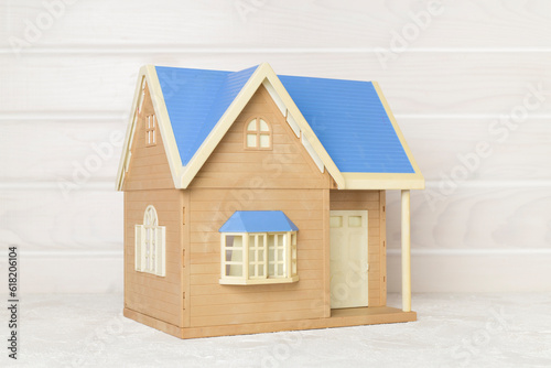 Model of house on wooden table