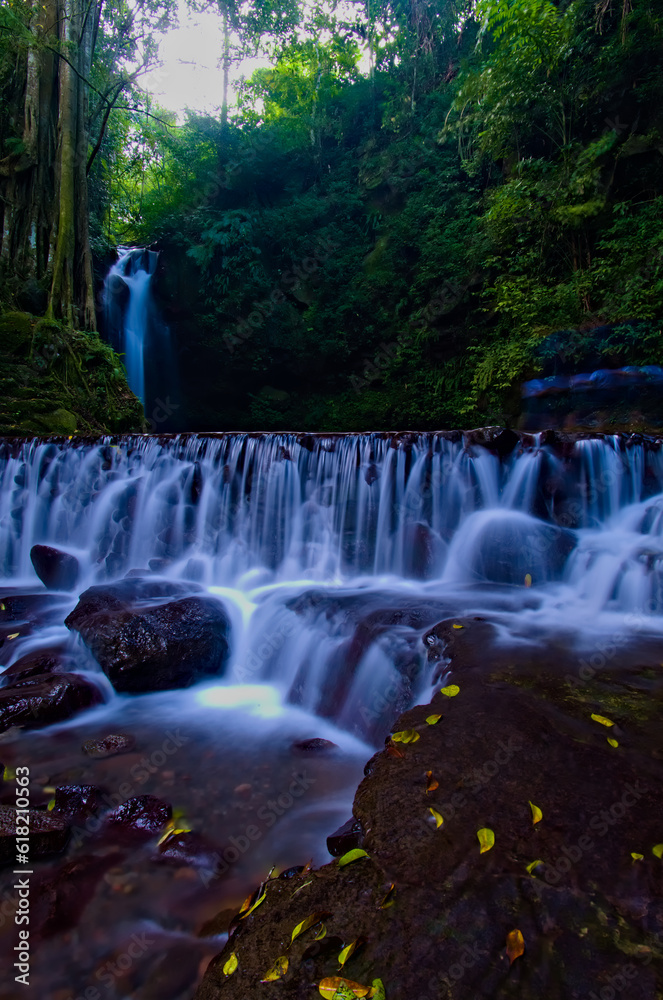 Fototapeta premium beautiful view of waterfall, water flow in river with waterfall view