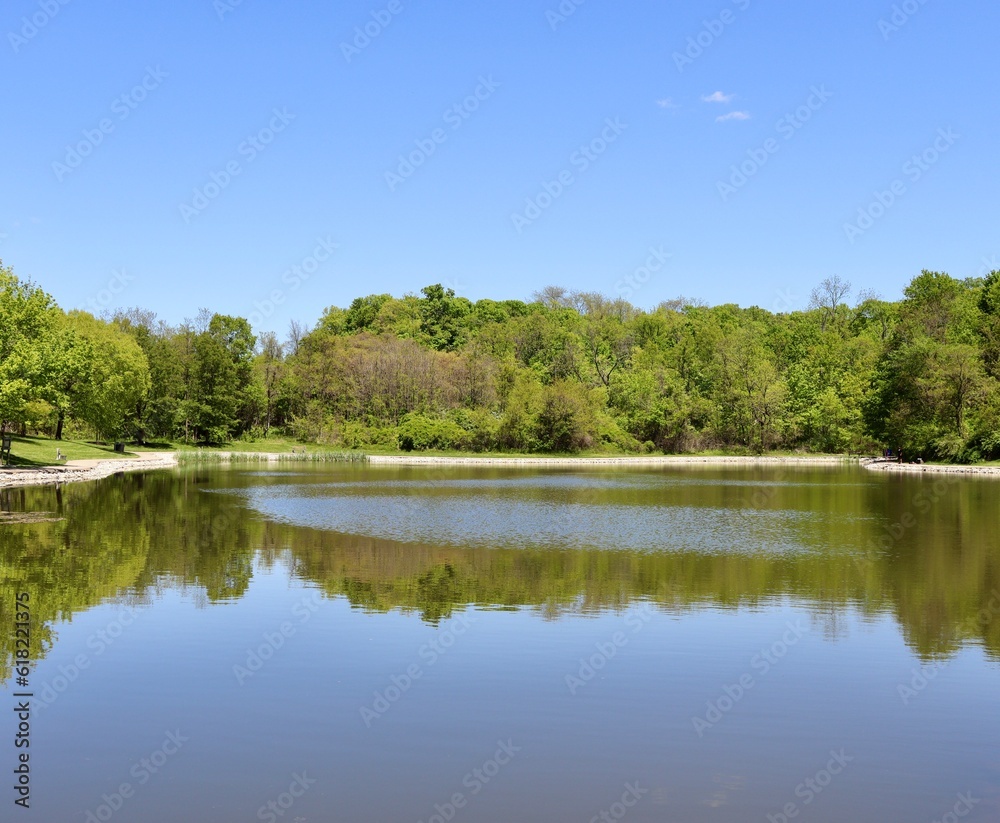 The peaceful lake in the in the country on a sunny day.