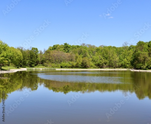 Fototapeta Naklejka Na Ścianę i Meble -  The peaceful lake in the in the country on a sunny day.